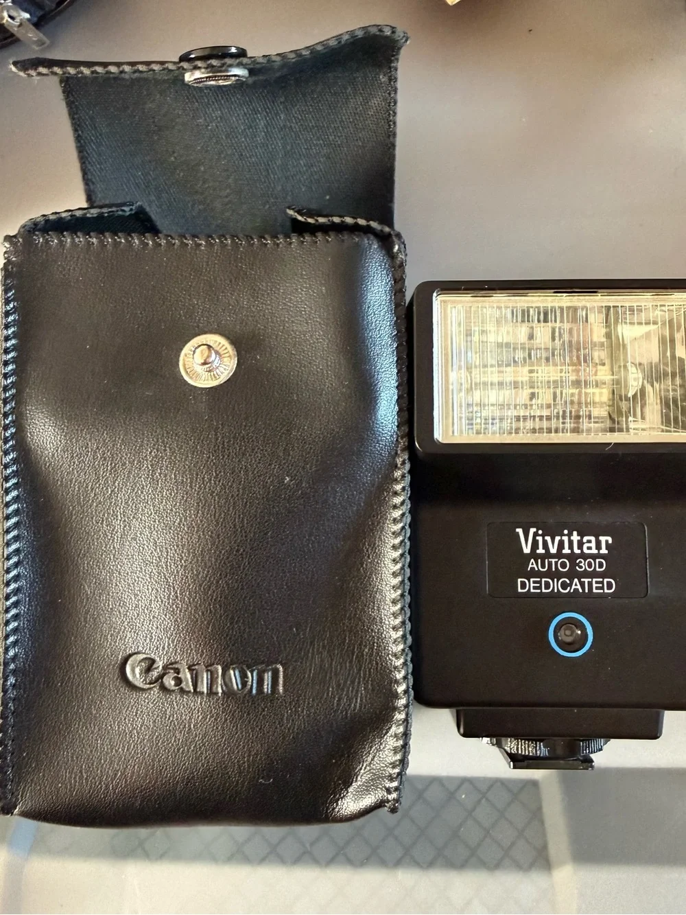 Vintage Canon Camera with lenses, filters, flash, tripod and other accessories.